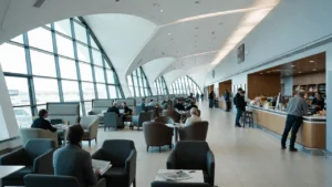 UK airport lounge with passengers using amenities and credit card displayed